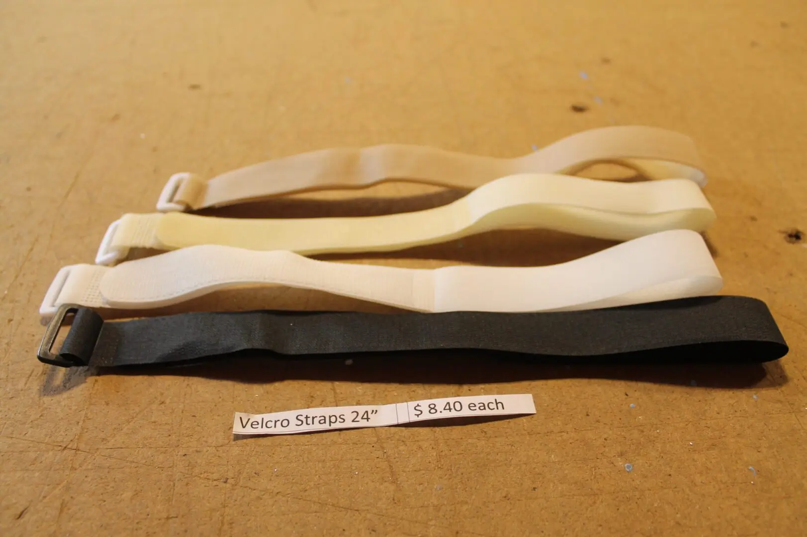 Velcro straps on display with pricing label.