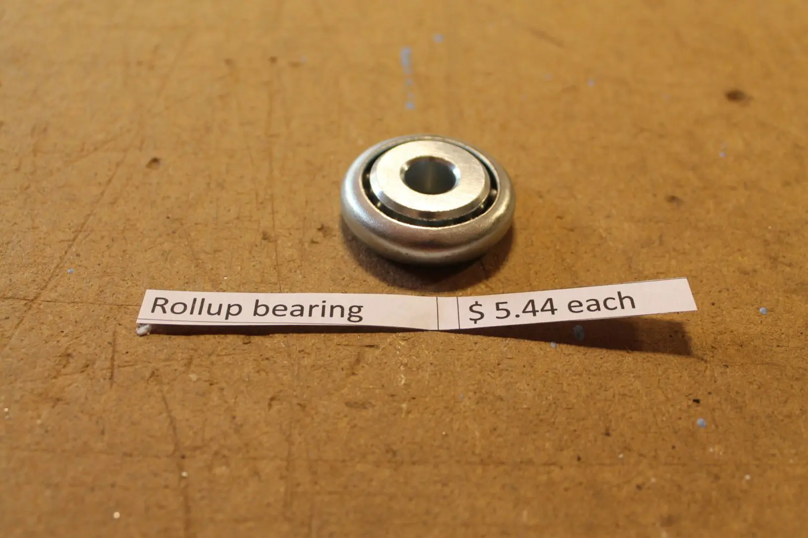 Rollup bearing with price tag, $5.44.