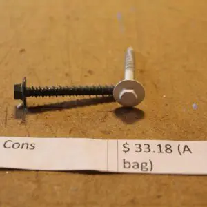 Tap cons with price label on table.