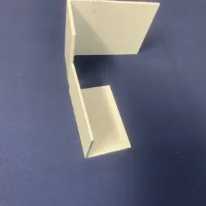 White geometric shapes on a blue background.