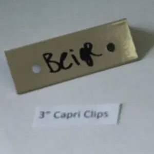 Beige sample with "3” Capri Clips" label.