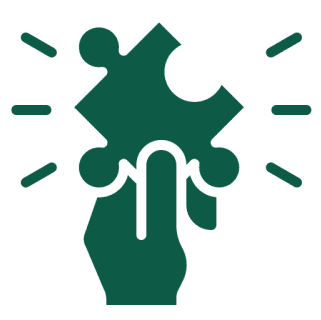 Hand holding puzzle piece with rays.